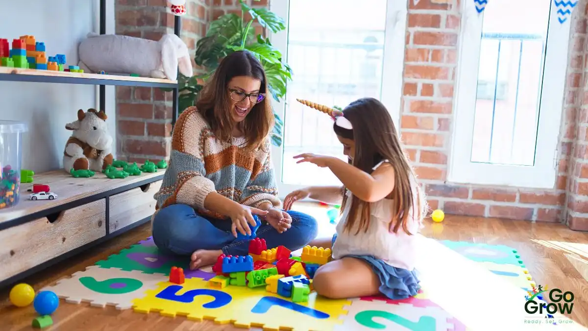 adult-supporting-child-through-play-based-learning-with-colorful-blocks