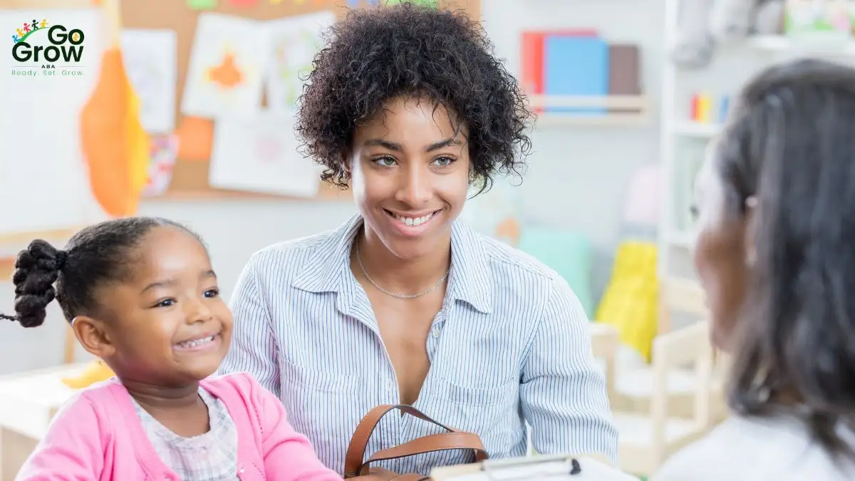 parent-and-child-meeting-with-teacher-in-early-learning-classroom