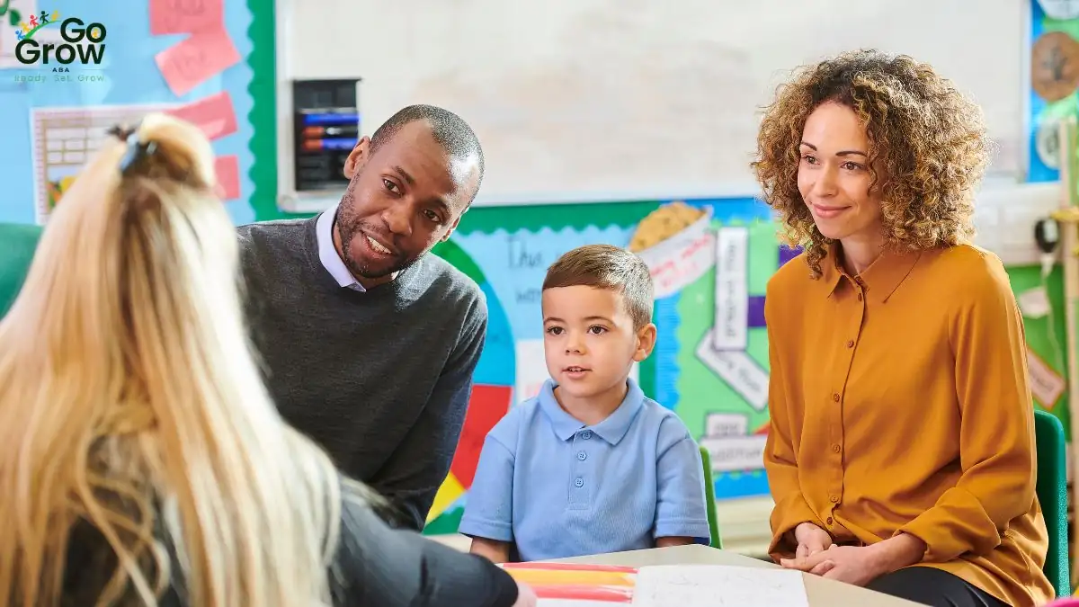 parents-and-child-meeting-with-teacher-in-school-support-conference