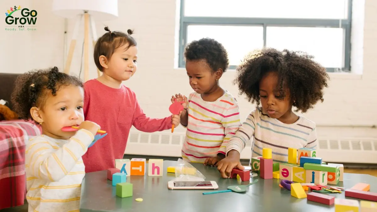 toddlers-playing-with-blocks-and-toys-during-group-learning-activity