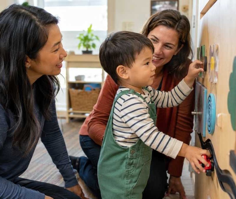 toddler-with-therapists-during-early-intervention-session
